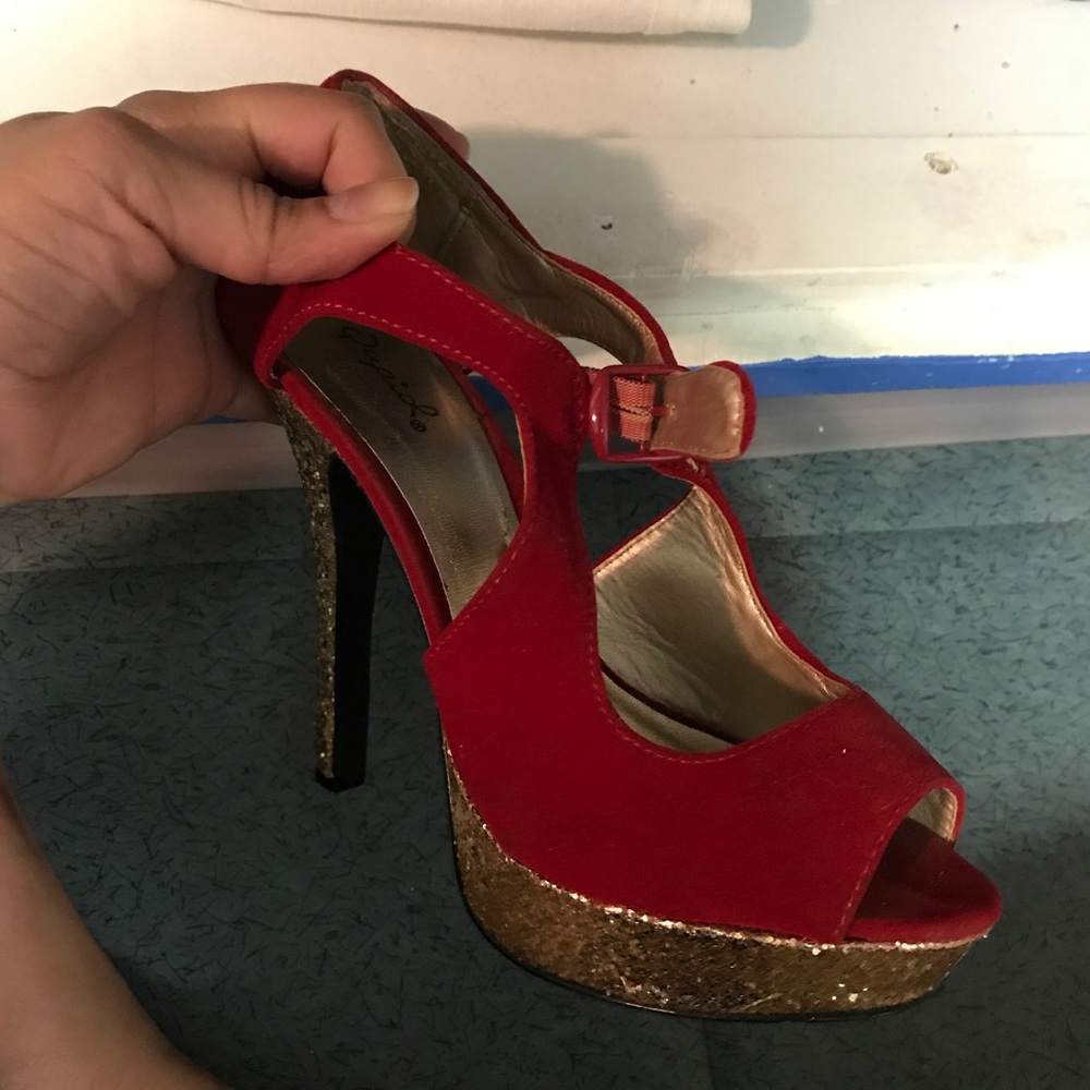 Red heels with gold bottoms